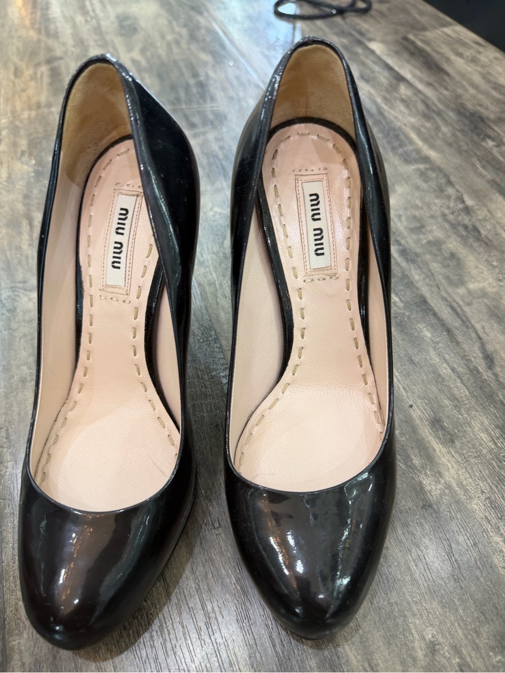 Miu Miu Black Patent Leather Pointed Pumps with Nude Insole